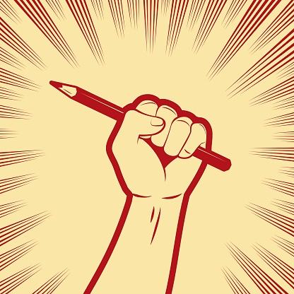 One strong fist holding a pencil