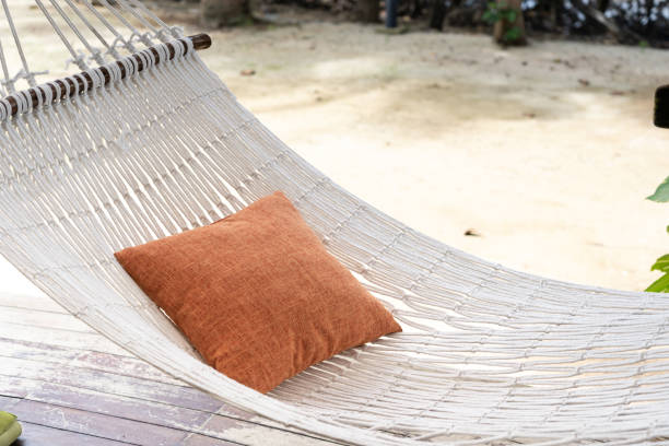 istock pillows on hammock in summer sunny beach. 1414894794
