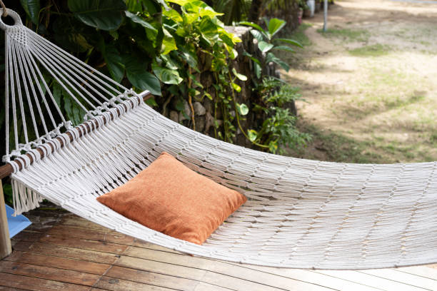 istock pillows on hammock in summer sunny beach. 1414894801