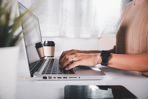 Typing keyboard. Female person text message for new project she remote work on computer, Closeup Hands of business woman over laptop keypad during working at desk, teen chat online with friend