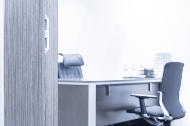 open wooden door and empty office