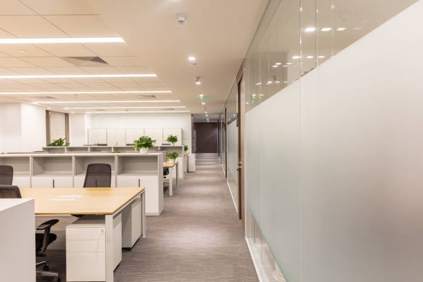 istock Modern style office interior, corridor with glass walls 1414899748