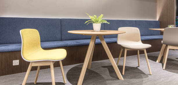 istock Comfortable seating area with round table and chairs 1414900222