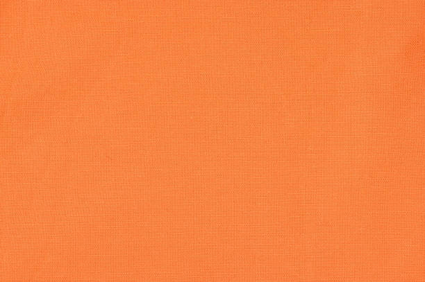 istock Against the background of orange fabric 1414901238