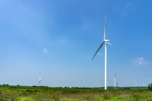 istock High-tech wind turbines on rural farmland 1414910003