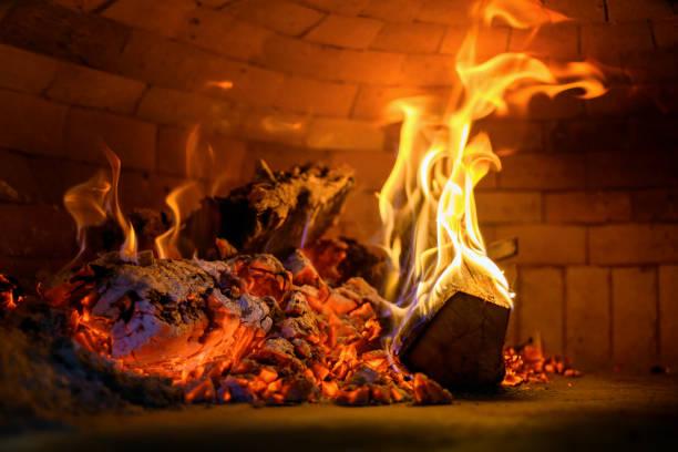 istock Fire wood burning in the oven 1414910777
