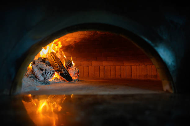 istock Fire wood burning in the oven 1414910782