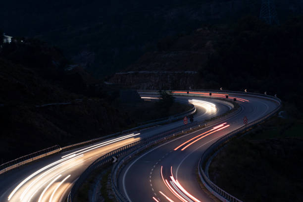 Light trails on road stock photo