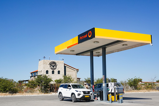 A four wheel drive car being filled with diesel at Petrosol Gas Station near Etosha National Park in Kunene Region, Namibia