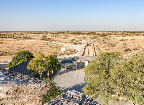 Road Construction near Okaukuejo Camp in Etosha National Park, Namibia, undertaken by commercial construction vehicles.