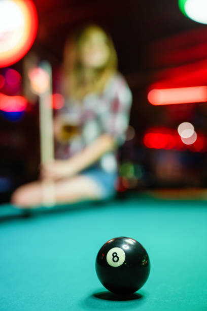 istock 8 Ball from pool or billiards on a billiard table. People entertainment game concept 1414920180