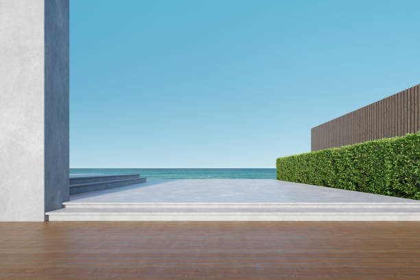 istock Empty concrete and wooden terrace with building wall on sea background. 3d rendering. 1414921147