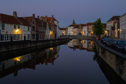 Brugge, Belgium - July 4, 2022: Langerei canal at dawn in summer