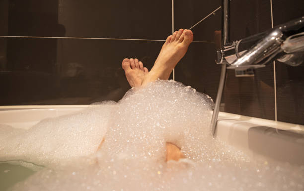 istock Bath filling up with water 1414923208