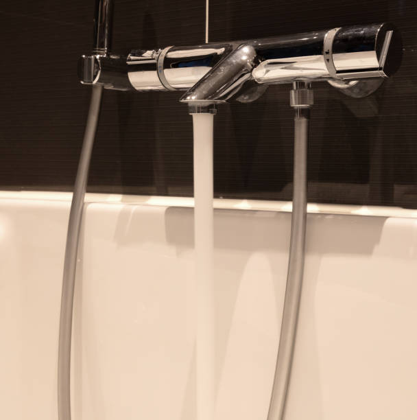 istock Bath filling up with water 1414923246