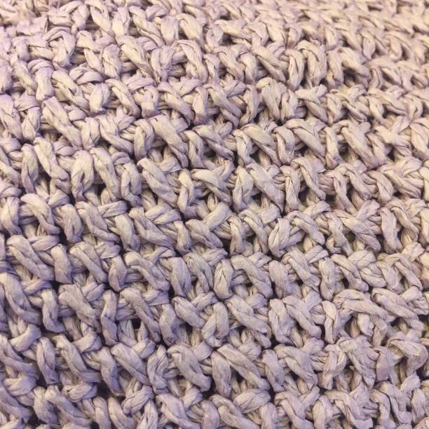istock Close-up background of woven wool fabric. 1414923385