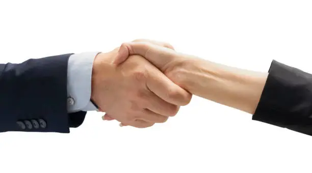 Close up of business people handshake in the office after meeting - Successful business man and business woman handshaking after good deal - isolated on white -  People Connection Deal Concept