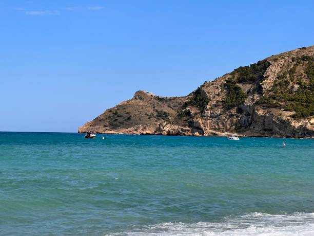 istock natural beach in l'albir, alicante, spain 1414925352