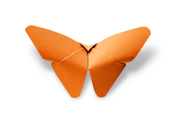 istock Orange paper butterfly origami isolated on a white background 1414925664