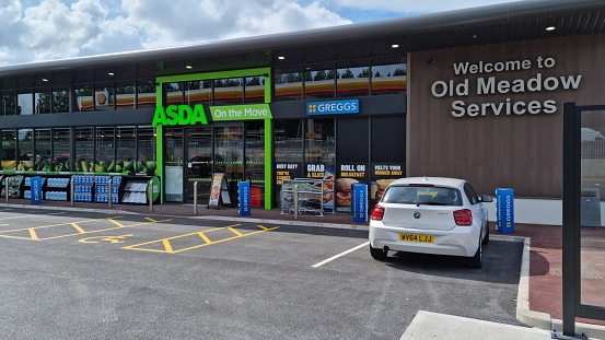 Asda On The Move storefront located on the Old Meadow service area. Operated by the EG Group owned by Mohsin Issa and Zuber Issa.