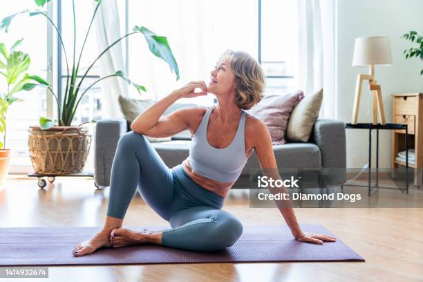 Beautiful Mature Senior Woman At Home Stock Photo - Download Image Now - Women, Exercising, Healthy Lifestyle