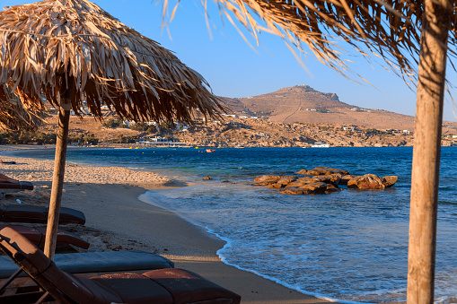 The beach is very long and consists of a sandy and a rocky stretch. Located on the South Eastern side of Mykonos Island with its beautiful blonde sands and crystal clear blue waters, Kalafatis Beach stretches approximately 2 km and is 70m wide.
