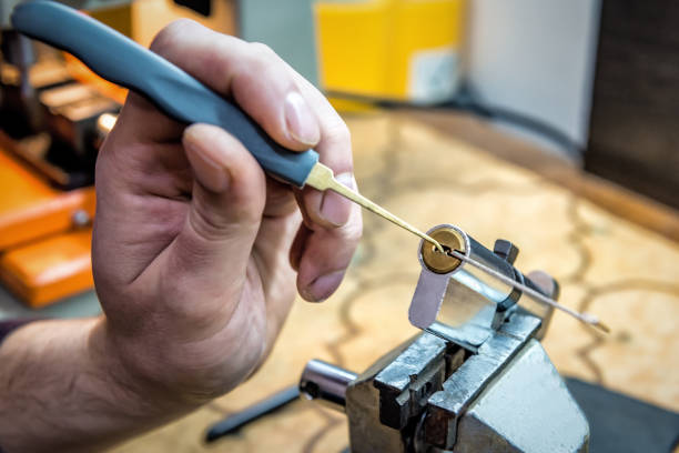 istock locksmith repairs door lock cylinder 1414942591