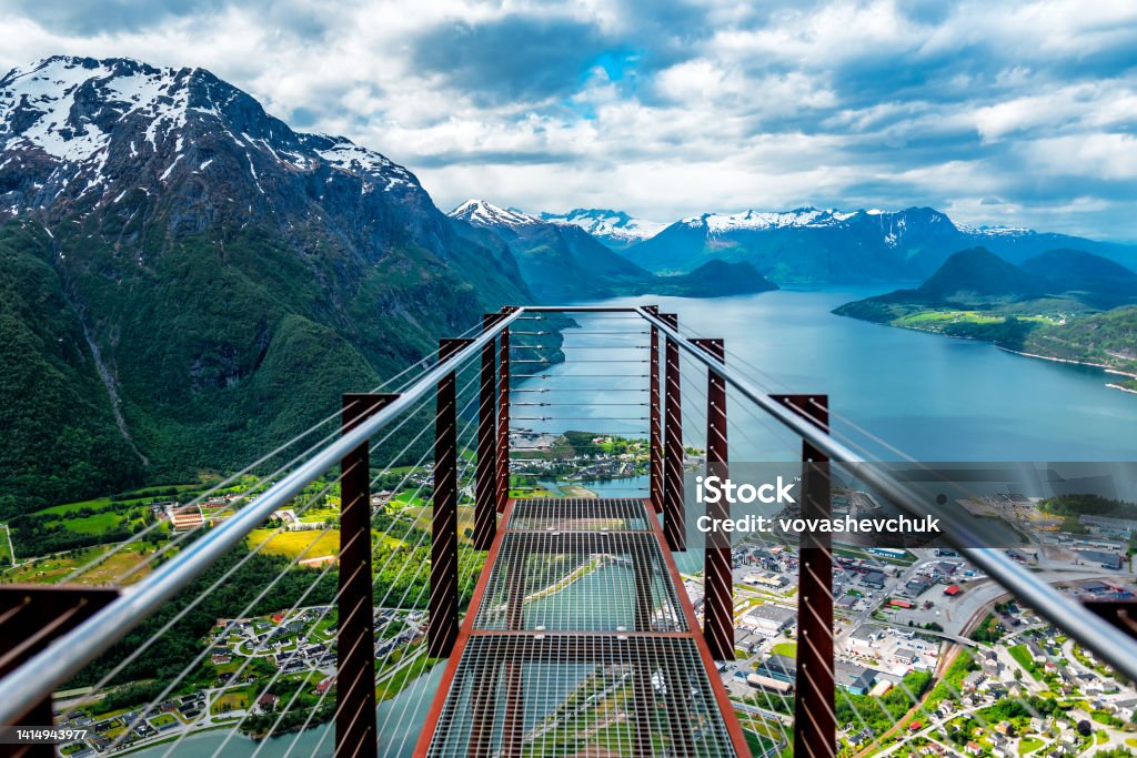 Observation deck Rampestreken in Andalsnes, Norway. Beautiful view on the mountains, the city and the fjords. Observation deck Rampestreken in Andalsnes, Norway. Beautiful view on the mountains, the city and the fjords. Tourist place in Norway. Viewpoint Stock Photo