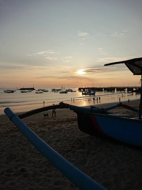 istock Sunset at the kuta beach 1414944124
