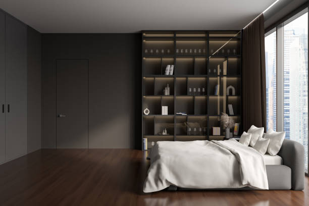 istock Grey bedroom interior with bed and shelf with decoration, panoramic window 1414944445