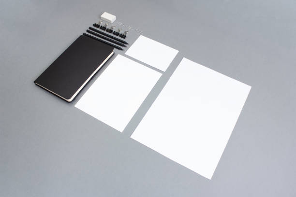 istock Business background. notebook and templates of different formats on a gray background 1414945247