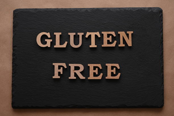 The letters Gluten free on a black background stock photo