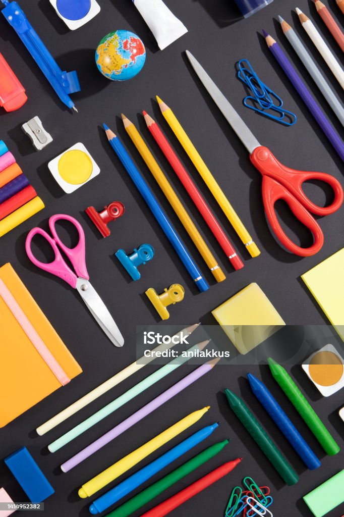 School Supplies Background Back to school concept with school supplies knolling on black background School Supplies Stock Photo