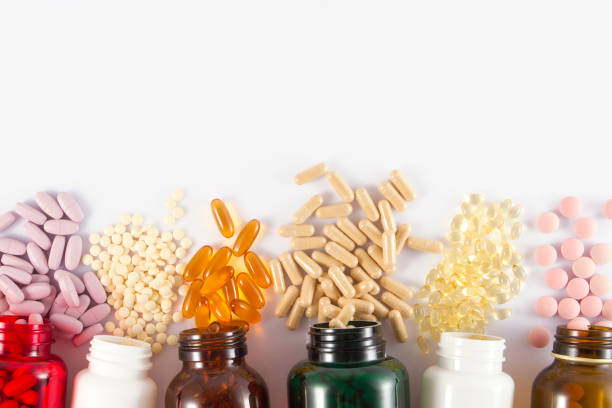 sfondo pillole - nutritional supplement foto e immagini stock