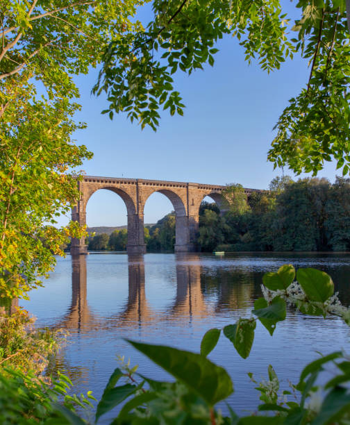istock landscape photo overlooking the architectural arch and the river 1414957641