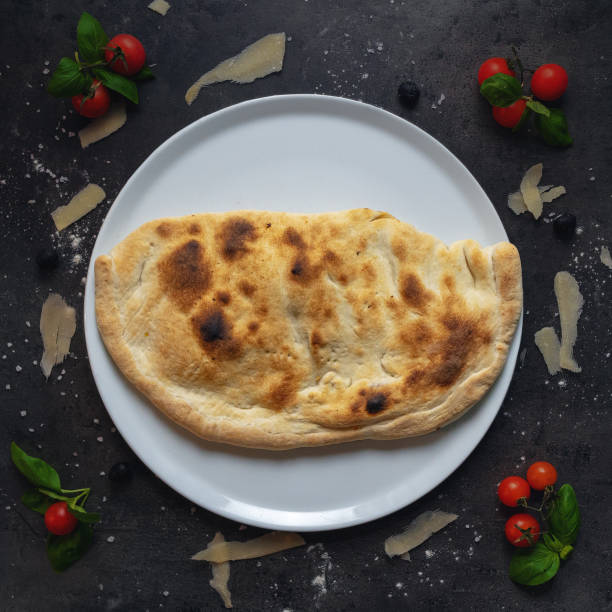 istock Delicious Italian Pizza Comico Style - Stuffed Pizzad, Top Down Shoot, Appetizing Background 1414958726