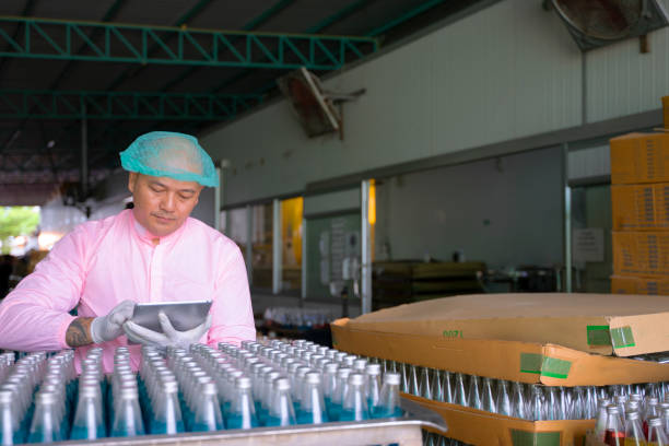 istock Employee is working at factory production line. 1414958924