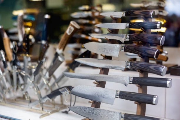istock Damascus steel knives in showcase 1414960419