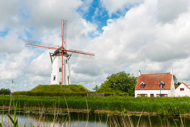 Bruges, Belgium old historical windmill in the park.
