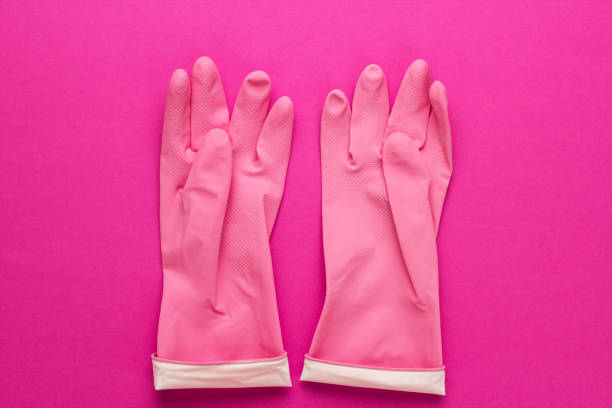 istock pink rubber cleaning gloves 1414963653