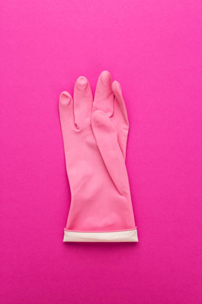 istock pink rubber cleaning glove 1414963655