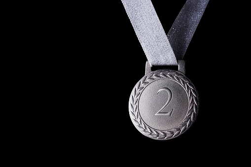 close up of silver medal