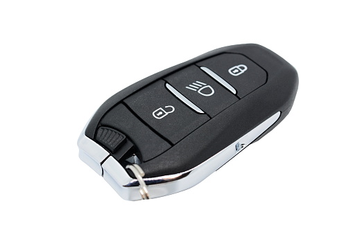 A car key with remote control isolated over white background