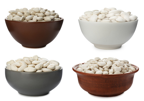 Set with uncooked beans on white background