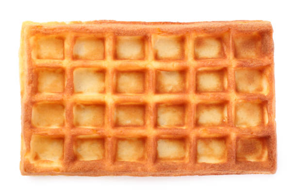 istock One delicious Belgian waffle isolated on white, top view 1414967378
