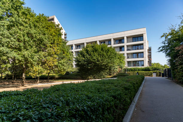istock Modern apartment building at a park 1414968173