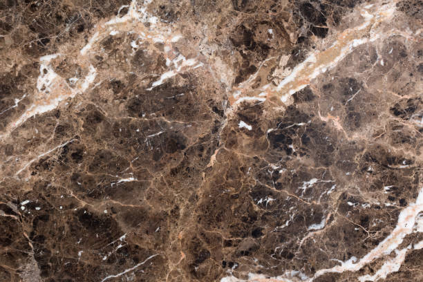 istock New Emperador Marble brown stone texture for your spectacular interior. 1414968429