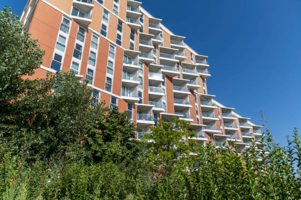 istock Modern apartment block with green bushes 1414968589