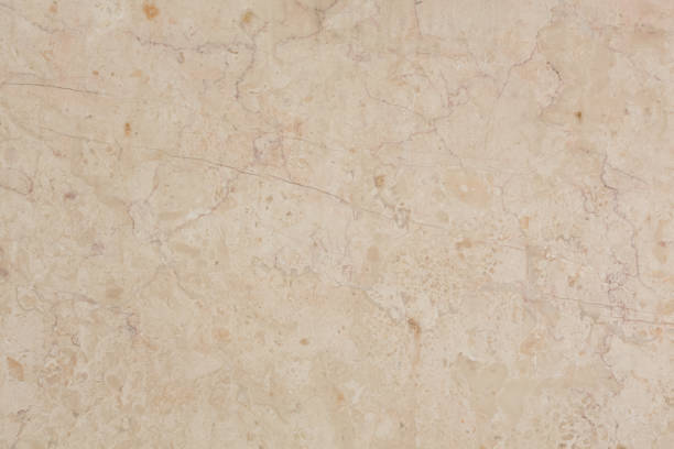 istock Crema Marfil Marble background in beige color. 1414968711