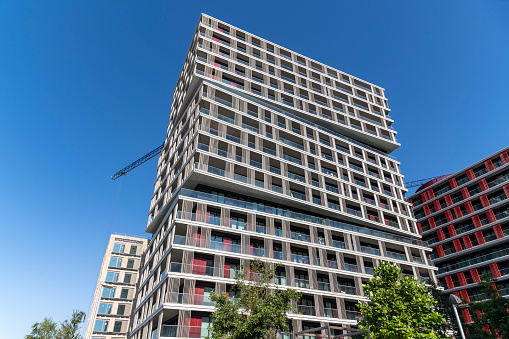 New residential buildings with outdoor facilities, apartment tower in East London.